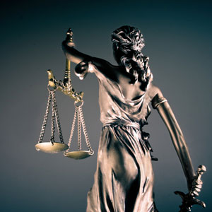 Female statue holding scales of justice