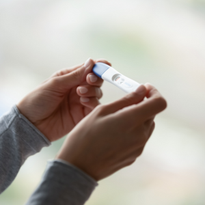 pic of hands holding a pregnancy test