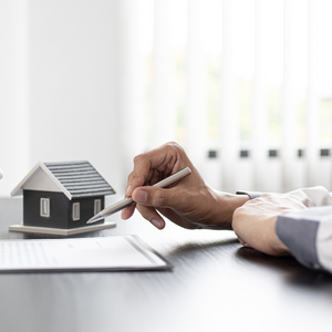 Picture of model house on desk