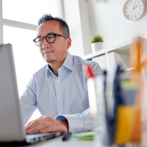 Picture of man working at computer