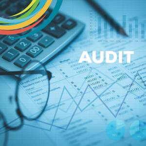 Picture of financial statements on desk with calculator, glasses and pencil and the word Audit over top of statements