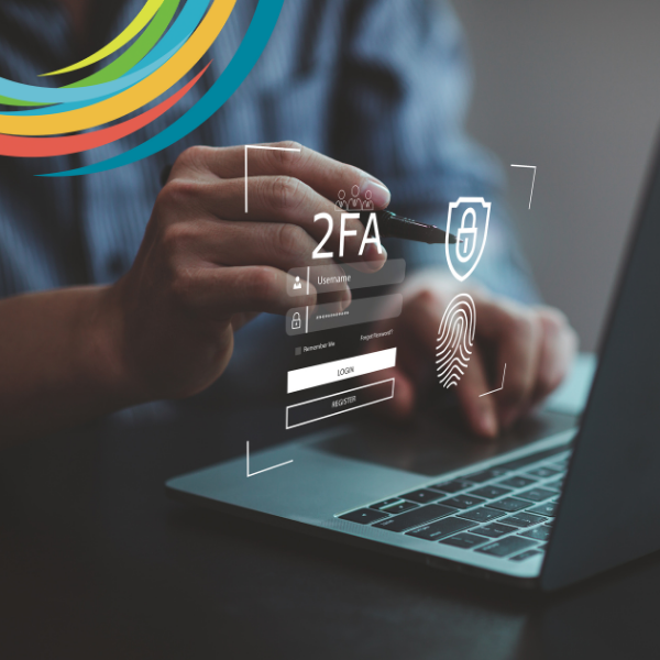 Person on laptop with multi-factor authentication (MFA) appearing on screen