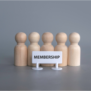 5 wooden people standing in a row with a sign reading Membership in front of them