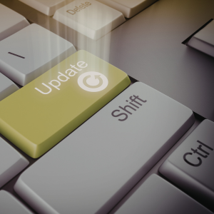 Picture of keyboard keys grey in colour with one green key that reads Update