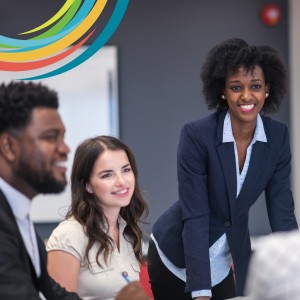Smiling female analyst presenting to smiling board members