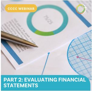 Financial statements with pen on desk
