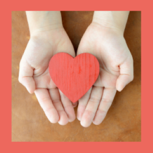 Picture of hands holding a red heart