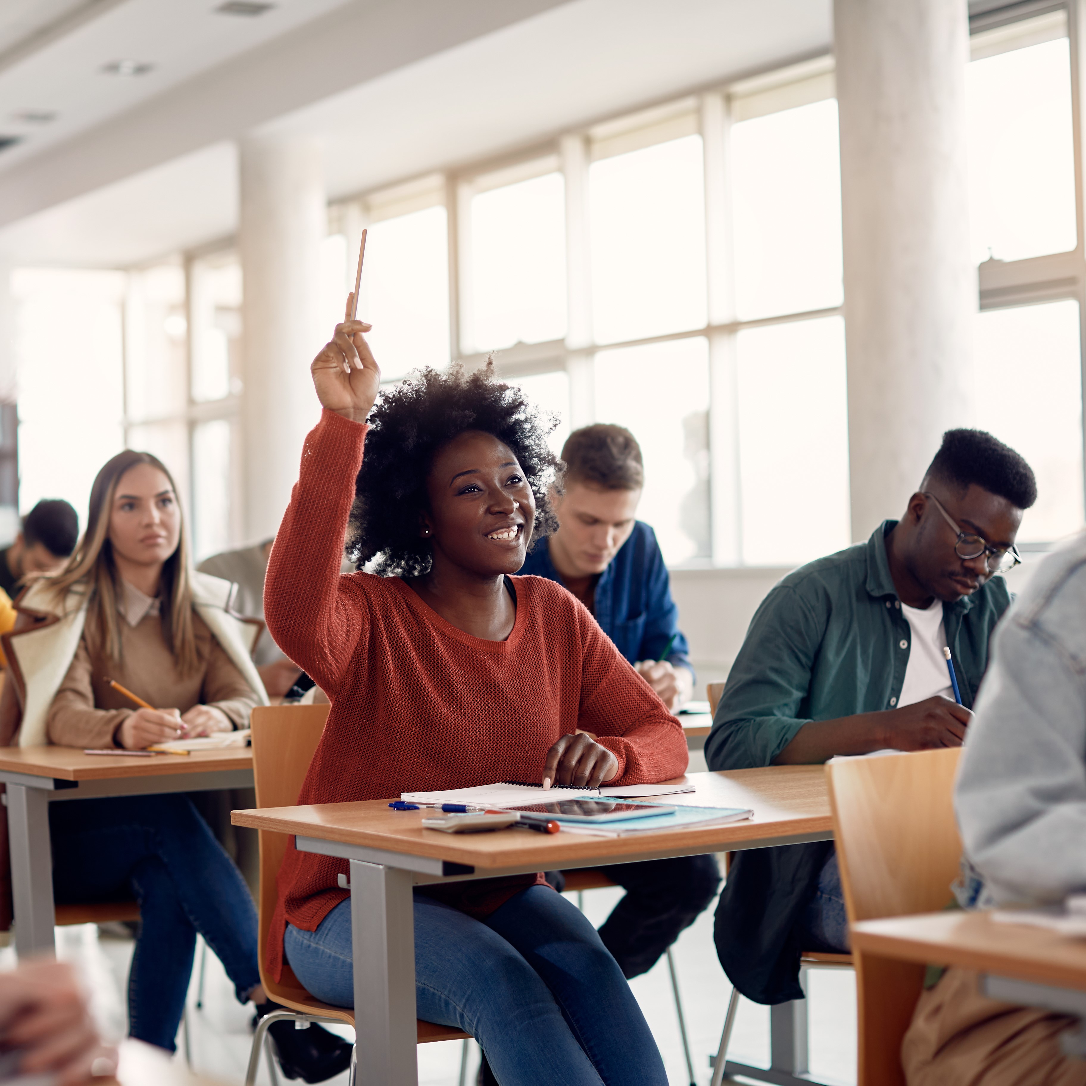 Picture of a group of young people sitting in a classroom.