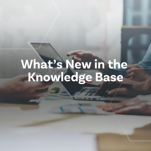 Picture of hands working on a laptop with words What's New in the Knowledge Base