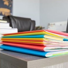 Picture of stack of file folders in various colours