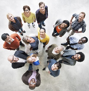 Picture of office workers standing and looking up