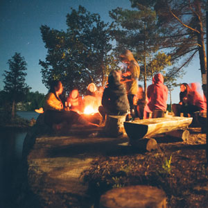 picture of people around a campfire