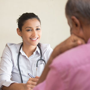 Picture of doctor smiling at patient