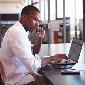 Picture of man working at computer
