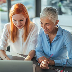 Picture of two women working at computer